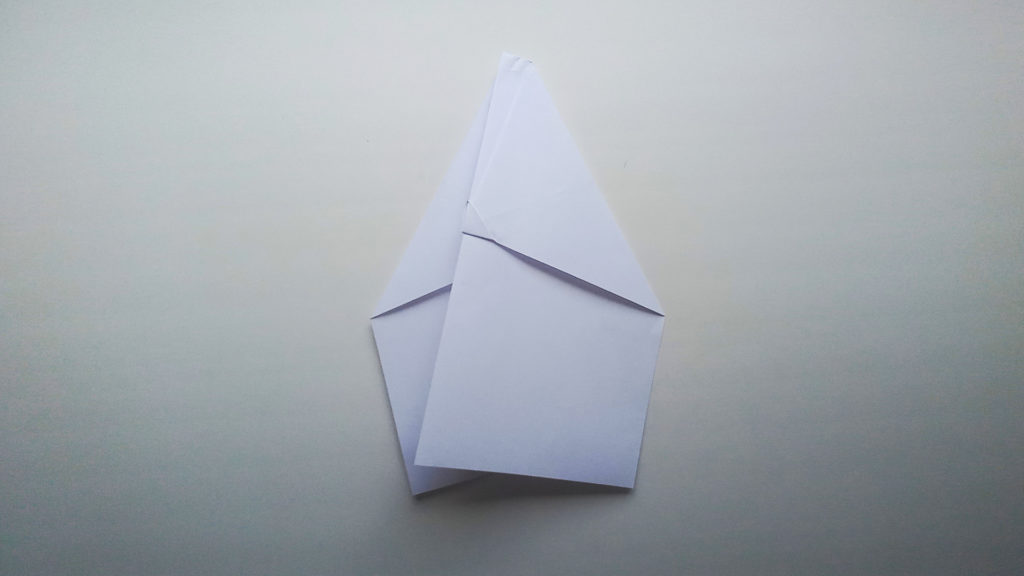 Бумажный самолетик Замок Накамуры - Шаг 10 - Переворачиваем фигуру